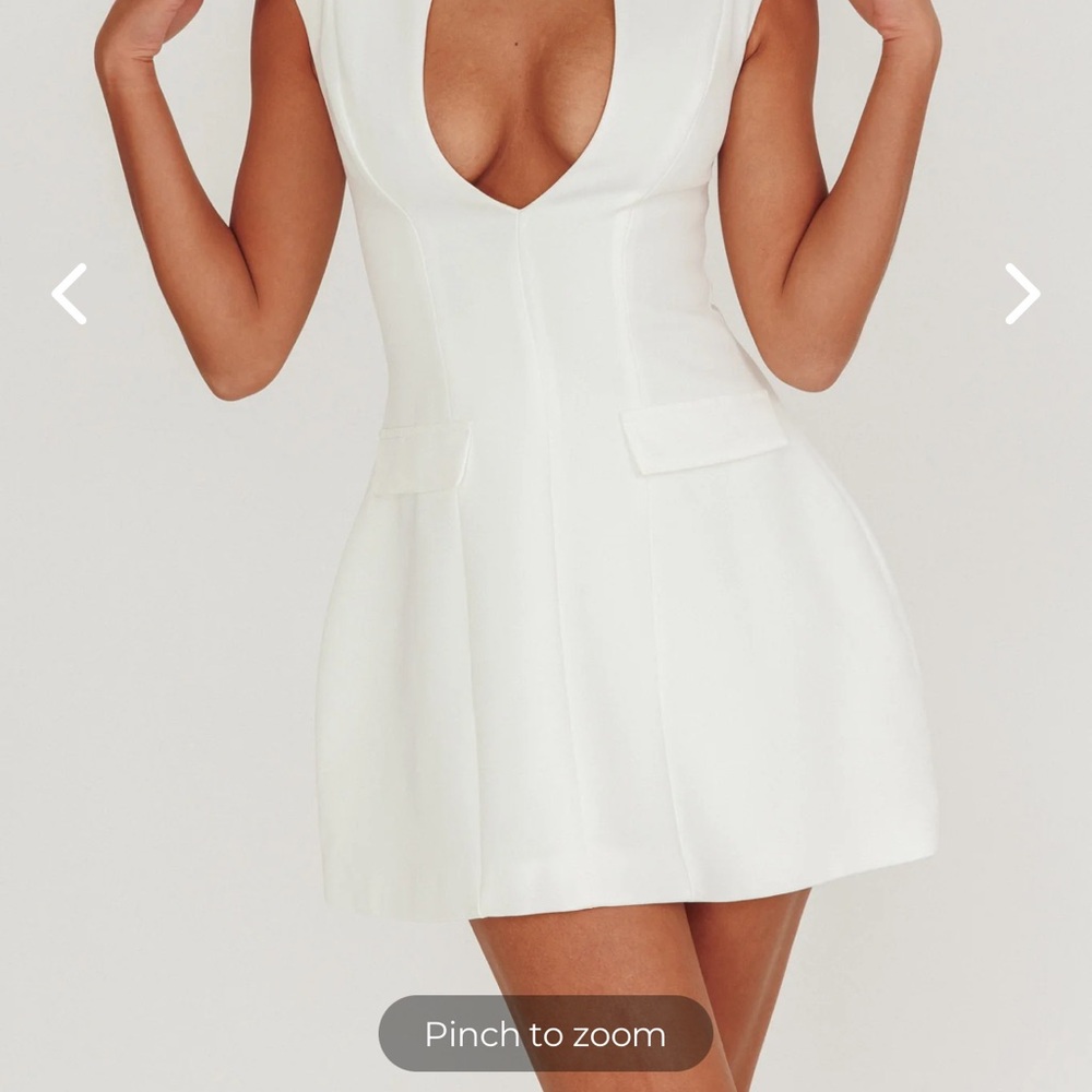 Brand New Tags and In Packing 
Elegant White Sleeveless Dress